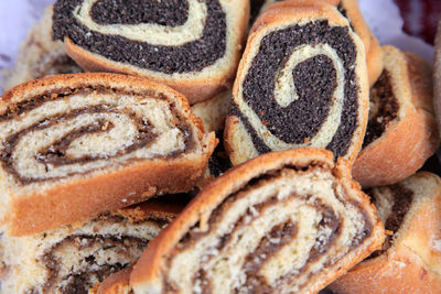 Close-up of poppy seed and walnut rolls during christmas