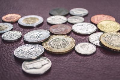 High angle view of coins on table