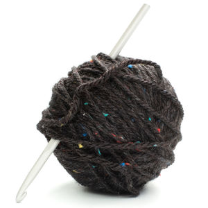 Close-up of carving on rock against white background