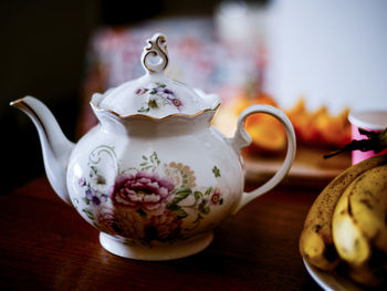 Close-up of teapot on table
