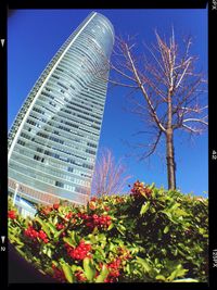 Low angle view of building against blue sky