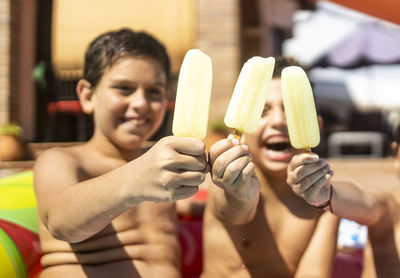 Boy holding ice cream