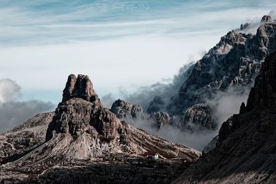 Panoramic view of mountain range against sky