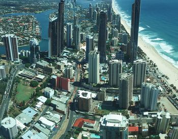 High angle view of modern buildings in city against sky