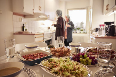 Women preparing eid al-fitr at home