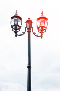 Low angle view of street light against sky