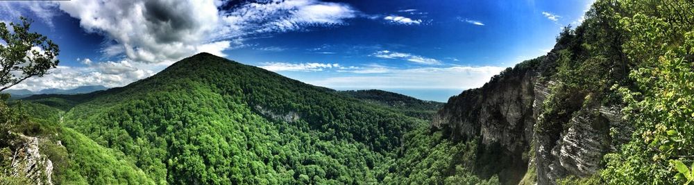 Panoramic view of mountains against sky