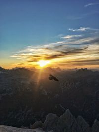 Scenic view of sunset sky over mountains