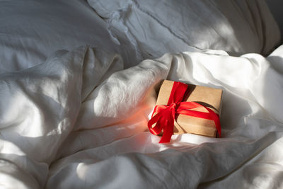 The gift lies on the bed in the morning