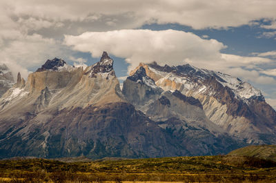 Scenic view of snowcapped mountains against sky