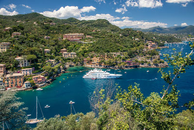 Landscaping overview of portofino harbour with  yachts and ships, view from castello brown, italy