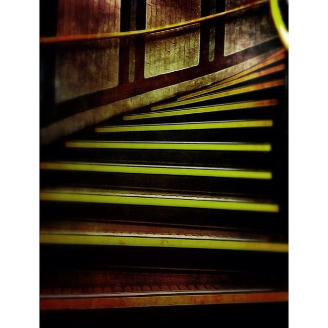 transfer print, auto post production filter, indoors, railing, built structure, architecture, steps, yellow, steps and staircases, no people, sunlight, pattern, shadow, staircase, day, close-up, transportation, high angle view, wall - building feature