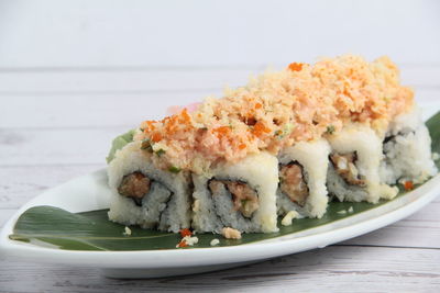 Close-up of sushi served in plate on table