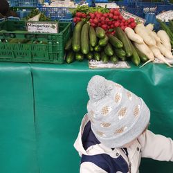 Baby at market stall