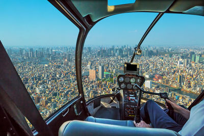 Aerial view of city seen through window