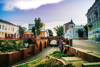 Bridge over city against sky