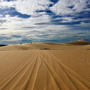 Scenic view of desert against sky