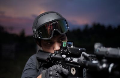 Rear view of man standing against sky