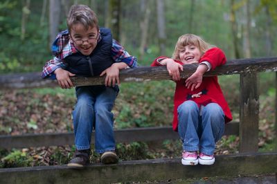 Full length portrait of boy and girl 