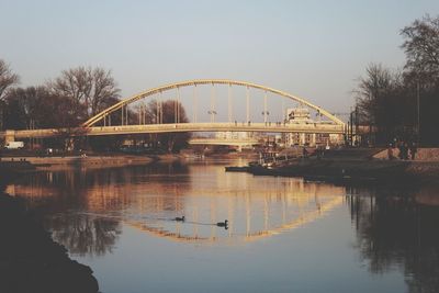 Bridge over river against sky