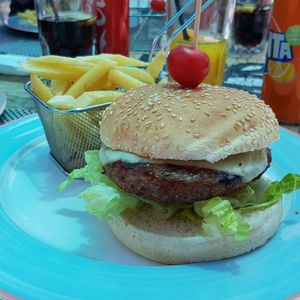 Close-up of burger in plate on table