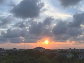 Scenic view of landscape against cloudy sky