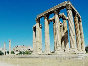 Low angle view of built structure against clear blue sky