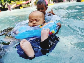 High angle view of people in swimming pool