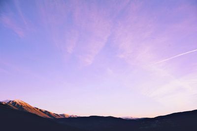 Silhouette mountain against sky during sunset