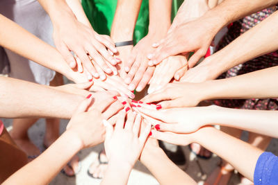 Close-up of hands holding baby