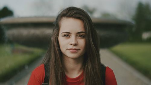 Portrait of smiling young woman outdoors