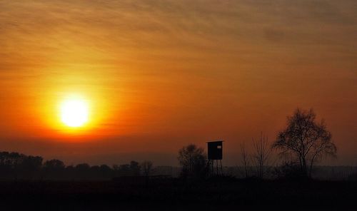 Scenic view of landscape at sunset