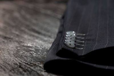 Close-up of guitar on table