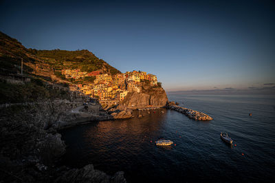 Manarola city of cinqe terre while sunset