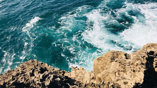 High angle view of rocks on beach