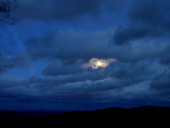 Scenic view of dramatic sky at sunset