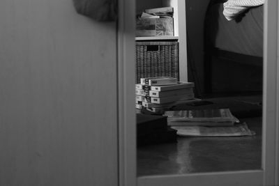 Close-up of man on table at home