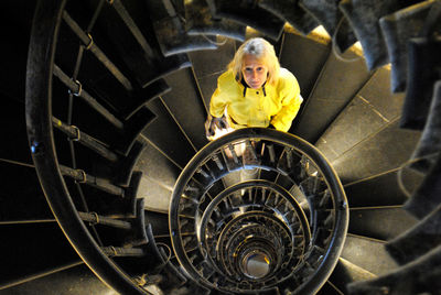 High angle view of man on staircase