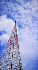 Low angle view of communications tower against sky