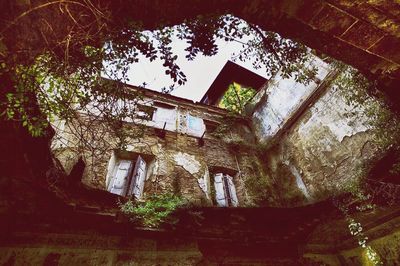 Low angle view of abandoned building