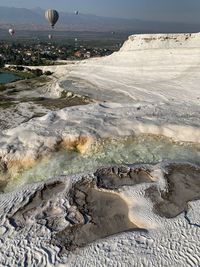 Scenic view of salt terraces landscape against sky in pamukkale turkey 