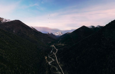 Scenic view of mountains against sky during sunset