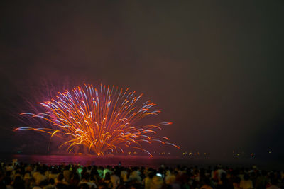 Firework display at night