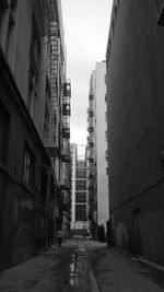 Road along buildings in city