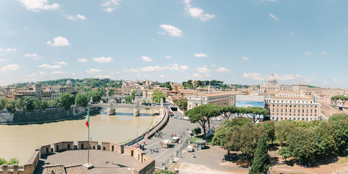 High angle view of trees and buildings against sky