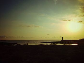 Scenic view of sea at sunset