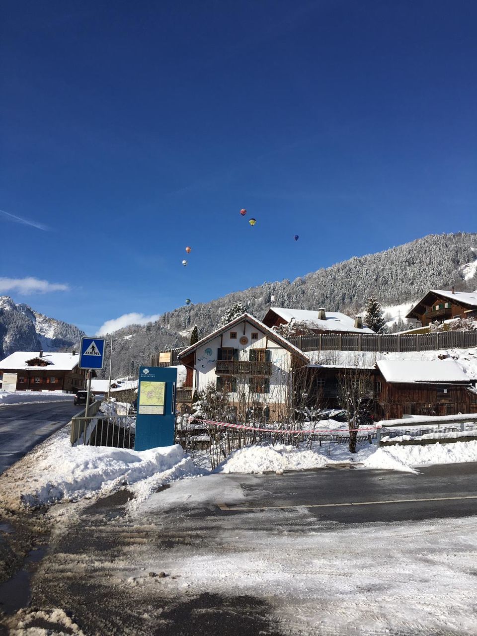 snow, winter, cold temperature, architecture, built structure, building exterior, sky, building, mountain, nature, day, no people, house, clear sky, blue, beauty in nature, scenics - nature, outdoors, snowcapped mountain