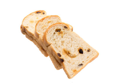 Close-up of bread against white background