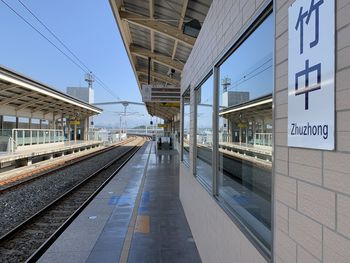 Railroad station platform against sky