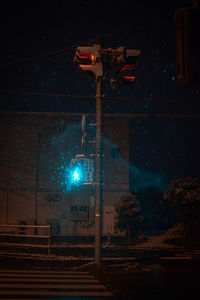 Illuminated street lights at night